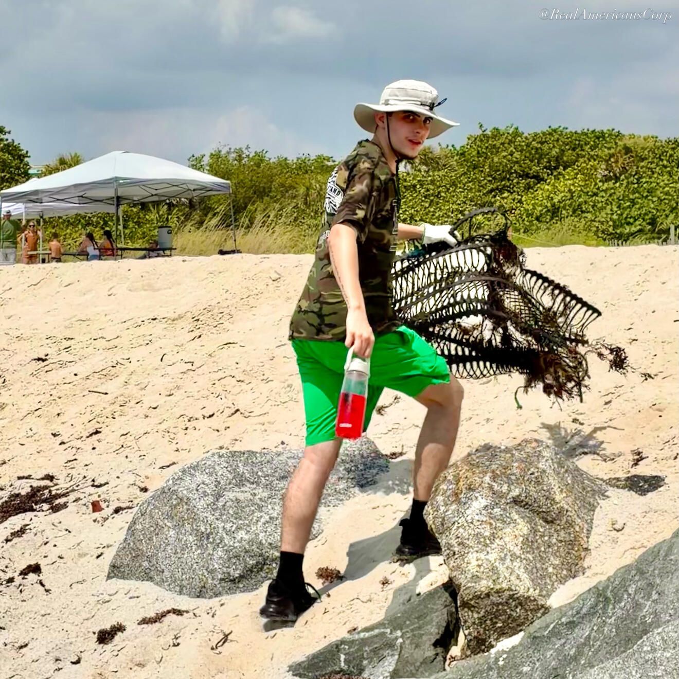 REAL AMERICANS CORPORATION Beach clean up